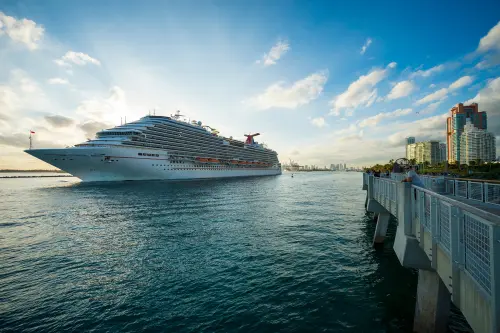 Repositioning cruise ship departing Fort Lauderdale at golden hour