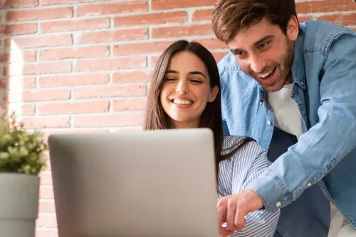 Kitchen table with maps, phones and a laptop during a fare hunt